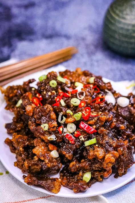 Crispy Chilli Beef is one of my favorite Chinese restaurant dishes—strips of tender beef are fried until crispy and then tossed in a sticky, sweet, spicy sauce. It’s easy to make at home, and no deep fryer is needed! Air Fried Crispy Chili Beef, Thai Food At Home, Crispy Beef Stir Fry, Crispy Beef Chinese, Crispy Chili Beef, Chilli Beef Recipe, Crispy Chilli Beef, Chili Beef, Asian Fusion Recipes