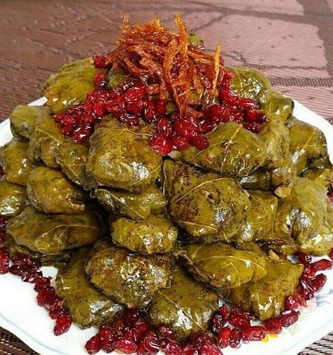 Dolmeh, a local food of Tabriz(meat, rice and vegetables wrapped in leaves of grape) Jordanian Recipes, Food Iran, Arabisk Mat, Persian Food Iranian Cuisine, Persian Dishes, Iranian Dishes, Kurdish Food, Iran Food, Iranian Recipes