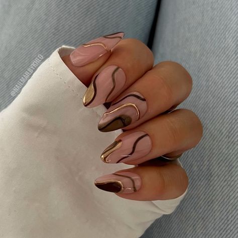 Abstract Gold Waves, , Trendy Fall Nails, autumn nails, autumn nail designs, fall color nails Brown Nails With Gold Design, Cute Brown Fall Nails, Brown Wavy Nails, Brown And Chrome Nails, Brown Wedding Nails, Nails 2024 Autumn Trends, Natural Autumn Nails, Autumn Nails Ideas 2024, Fall Nails Baddie