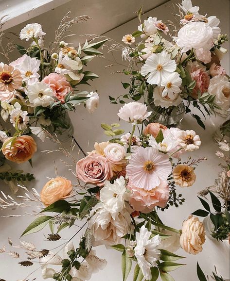 Large Ceremony Flower Arrangements, Neutral Flowers With Pop Of Color, Cream And Peach Wedding Flowers, Bridesmaids Bouquets Wildflowers, Pink Poppies Bouquet, Round Table Floral Centerpieces Wedding, Earth Tone Wildflower Bouquet, Fall Garden Wedding Bouquet, Soft Peach Wedding Theme