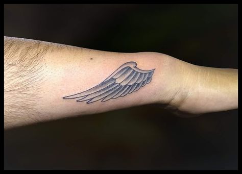 single Wing Tattoo on wrist. #wingtattoo #smallwingtattoo #angeltattoostudioindore #indoretattooartist follow on Instagram: angeltattoostudio_Indore Wrist Wings Tattoo, Wings On Wrist Tattoo, Single Wing Tattoo, Angle Wing Tattoos, Wing Tattoos On Wrist, Small Wings Tattoo, Small Angel Wing Tattoo, Om Tattoo Design, Tattoo On Wrist