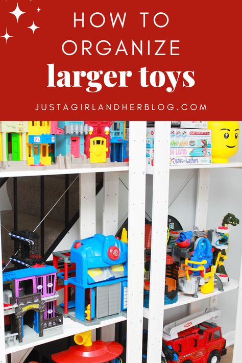 Big Toys Storage Ideas, Toys Rack Storage Ideas, Car Track Toy Storage, Organizing Big Toys Small Spaces, Organizing Big Toy Trucks, Bulky Toy Storage, Storing Large Toys In Playroom, Toy Storage For Big Toys, Toy House Storage Ideas