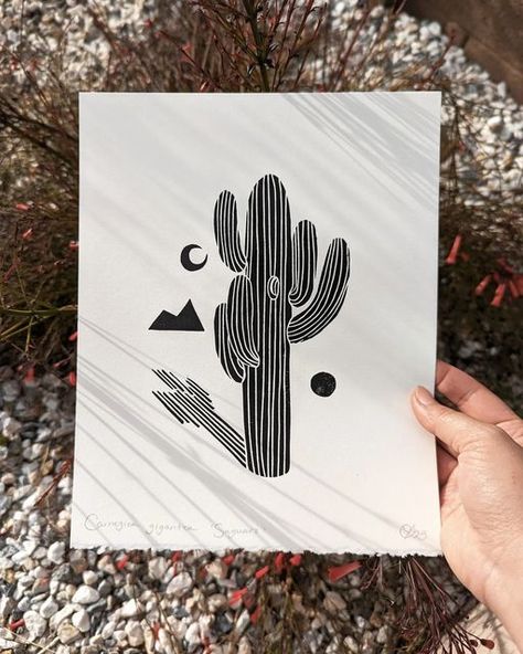 Olivia Yuen on Instagram: "Carnegiea gigantea (Saguaro cactus)🌵 The image of the Saguaro cactus is so common in Sonoran desert art, that I hesitated up until this point to create a print of one. I decided to make a simple design that celebrates it's recognizable form and unique structure." Cactus Screen Print, Cactus Lino Print, Desert Linocut, Cactus Linocut, Print Carving, Linocut Prints Simple, Lino Cut, Linocut Art, Wood Block Printing