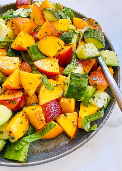 Easy Cucumber, Peach, and Basil Salad! Cool, crunchy cucumbers combined with sweet, juicy peaches and dressed in a peppery basil vinaigrette is a great way to make the most of summer and all its gorgeous flavors. This refreshing salad is easy to make and goes great with grilled meat. #simplyrecipes #peach #salad #cucumberpeachsalad #summersalad Basil Cucumber Salad, Peach Salad Recipes, Basil Salad, Summertime Salads, Cucumber Salad Recipe, Basil Vinaigrette, Foods For Healthy Skin, Summertime Recipes, Peach Salad