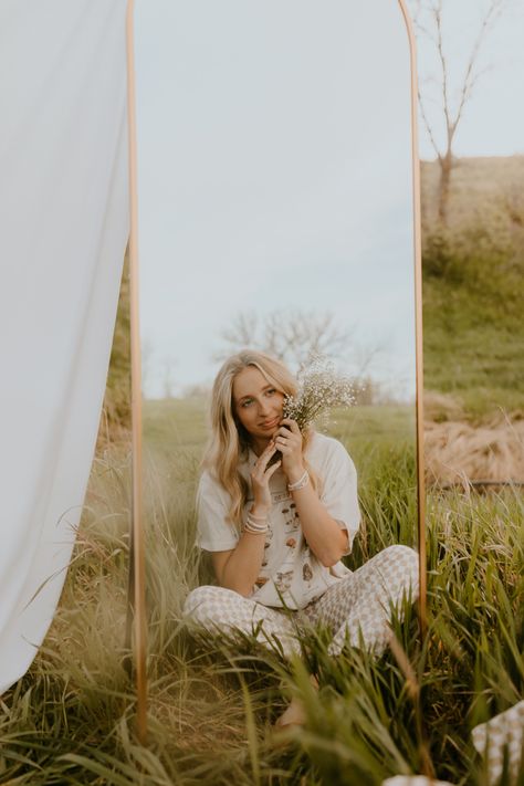 Boho senior pictures with a mirror and wildflowers Senior Pic Prop Ideas, Cactus Senior Pictures, Portrait With Mirror Photography, Boho Senior Photoshoot, Senior Pictures With Mirrors, Garden Of The Gods Senior Pictures, Senior Pics With Props, Senior Picture Ideas Mirror, Vintage Aesthetic Senior Pictures