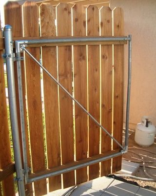 How To Add Height To A Fence, Chain Link Gate Ideas, Chain Link Fence Gate Ideas, Wood Fence Over Chain Link, Post Fence, Building A Gate, Wooden Fence Gate, Lattice Garden, Wood Fence Gates