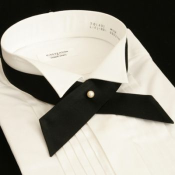 A very elegant alternative to a tie is the continental tie. A continental tie is a very simple piece, consisting of a single strip made from silk or satin, that crosses over at the throat, where it is fasted by a pin or a snap.  See 5 Neckwear Alternatives that are Not Ties http://attireclub.org/2015/10/25/neckwear-alternatives-ties/  #mensfashion #Mensstyle #mensaccessories Alternative Men, Groom Suit Grey, Ties For Men, Tie Men, Neck Accessories, Floral Arrangements Wedding, Groom Outfit, Cross Design, Cross Designs