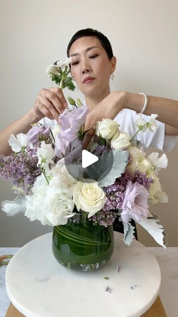 NYC Wedding and Events Florist on Instagram: "A plushier larger version of the purple arrangement featuring lilacs, sweet peas, and anemones. ✔️Save✨Like✨Share✨Follow for an even plushier purple coming soon 💜 🎥 I film in the kitchen of my flower studio, and my mom (who works here) kept interrupting to make me lunch 😊🍜 #flowerarranging #floraldesign #floristsofinstagram #nycflorist #rachelchofloral" Purple And White Flower Arrangements, Lilac Flower Arrangements, Purple Flower Arrangements, Florist Studio, Nyc Florist, White Flower Arrangements, Floral Arranging, Flower Studio, Sympathy Flowers