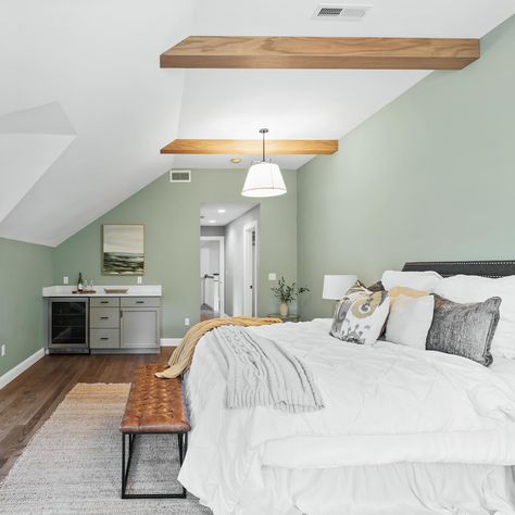 If Spring was a bedroom 🌱✨ we chose this fresh sage green wall color which contrasts so beautifully with the stained wood ceiling beams. The natural light in here is a dream, and even better… there’s a mini bar! Who wouldn’t want a primary suite with a wine fridge?! Project: Nature-Inspired New Home Tour Paint color: @benjaminmoore Misted Green 2138-50 #primarybedroom #greenwalls #greenbedroom #masterbedroom Sage Green Wall Color, Misted Green, Stained Wood Ceiling, Sea Salt Paint, Wood Ceiling Beams, Green Wall Color, Sage Green Wall, Fresh Sage, Primary Suite