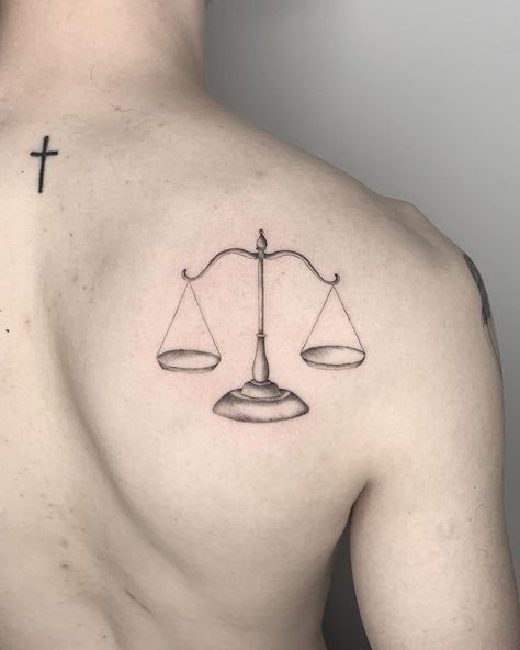 Justice tattoo by Conz Thomas inked on the right shoulder Lawyer Tattoo, Scales Of Justice Tattoo, Justice Tattoo, Balance Tattoo, Tato Minimal, Scale Tattoo, 1 Tattoo, Cross Tattoo, Back Tattoos