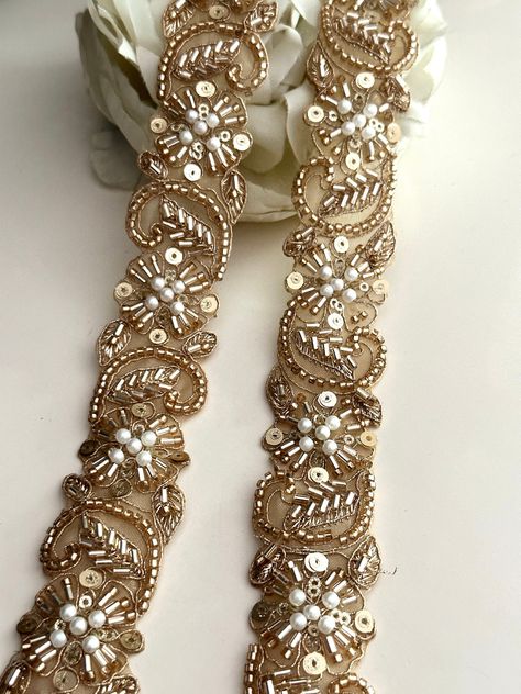 Embellish your designs with this stunning embellished pearl trim  that combine beautiful Glass bead accents. The Beautiful Hand Made Fringe Is Gothic and perfect for costume designers and add a touch of grandeur and opulence to your attire.  We are constantly adding new items and you will be sure to find our complete inventory with 1000's of designs at www.lacetrimssindia.com PLEASE NOTE : ALL ORDERS ARE SHIPPED FROM THE INDIA RETURN POLICY *All broken case can be re-sent or refund if the condit Fancy Laces, Lace Fancy, Saree Wearing Styles, Hand Work Design, Sewing Lace, Border Embroidery Designs, Wedding Sash, Neckline Designs, Embroidery On Clothes