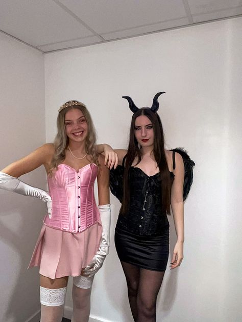 Halloween Costumes Duo Blonde, Corset Duo Halloween Costumes, The Blonde And The Brunette Duo, Black And Pink Halloween Costumes, Pink Character Costumes, Princess Aurora And Maleficent Costume, Brunete Costumes, Halloween Costumes With Pink Skirt, Princess Duo Halloween Costumes