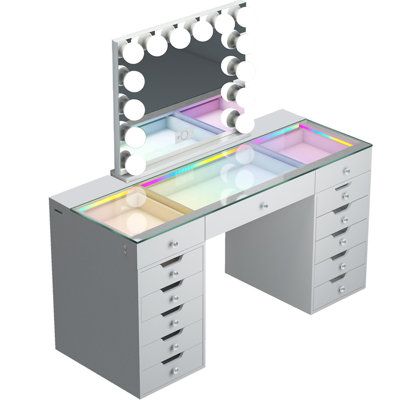 This modern dressing table is equipped with an LED transparent glass desktop, and the dressing table has 7 lighting modes. Press and hold the button to adjust it according to different scenes and makeup needs. The oversized Hollywood LED makeup mirror has 14 dimmable LED bulbs, the mirror base is detachable, the LCD touch screen display, two Bluetooth speakers, and there are sockets and USB charging ports to meet your different needs for home makeup, salon or live broadcast. The spacious transpa Modern Dressing Table, Elegant Vanity, Daybed Mattress, Traditional Vanity, Vanity Table Set, Small Space Bedroom, Led Makeup Mirror, Teen Bedroom Furniture, Dressing Area