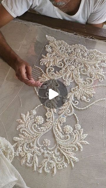 Rizwan Beyg on Instagram: "Ivory long coat ... tone on tone cotton net embroidered in ribbons ,pearls ,silk floss ,stones and French knots... for those of you that know and understand the beauty of hand embroidered vs multi head machine embroidery ...bespoke couture at Rizwan Beyg Design. Only on order.  #rizwanbeygbunyaad #rizwanbeygbridals  #rizwanbeygcouture" Stone Embroidery Design, Pearl Embroidery Designs, French Knot Embroidery Designs, Embroidery On Net, French Knots Embroidery, French Knot Embroidery, Pearl Embroidery, Embroidered Coat, Fashion Embroidery