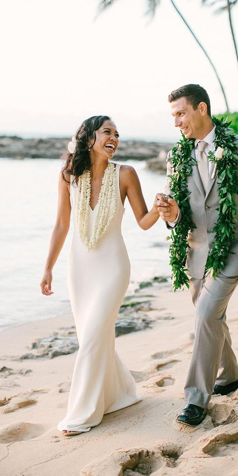 18 Hawaiian Wedding Dresses For Your Love Story | Wedding Dresses Guide Hawaiian Wedding Dress, Polynesian Wedding, Tropical Locations, Hawaii Wedding Dress, Wedding Lei, Tropical Wedding Dresses, Wedding In Hawaii, Hawaii Dress, Kauai Wedding