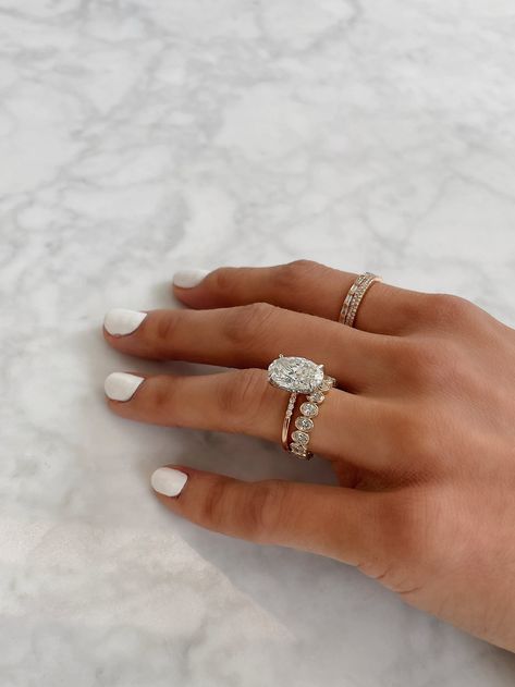 Layered Wedding Ring Set, Engagement Ring Oval With Wedding Band, Stackable Oval Engagement Rings, Engagement Rings Stacking, Dainty Wedding Ring Stack, Stacked Bands With Engagement Ring, Most Elegant Engagement Rings, Oval Solitaire Wedding Stack, Wedding Bands Oval Engagement Ring