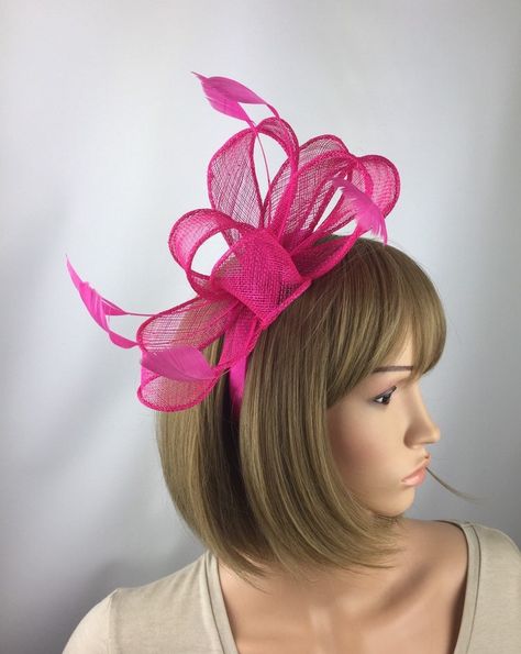 Pretty Elegant fuchsia pink hot Pink fascinator perfect for a wedding, mother of the bride or guest, a day at the races, a tea party, bbq, dinner dance or a memorable occasion, garden parties, hen night, etc Striking pink bow fascinator is made from sinamay and complemented by beautiful feathers. This quality fascinator is mounted on a metal clip so is easy to wear. Approximate size of fascinator is approx 14cm x 22cm (excluding feathers). This simple design adds that special touch without too m Pink Hatinator, Hair Styles With Hats, Ivory Fascinator, Green Fascinator, Wedding Mother Of The Bride, Red Fascinator, Hot Pink Weddings, Blue Fascinator, Bbq Dinner