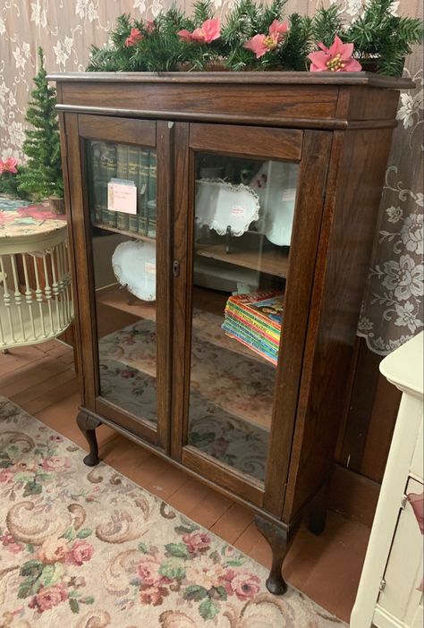 Antique raised display case on legs with glass doors Books In Glass Cabinet, Antique Glass Front Cabinet, Vintage Bookcase With Glass Doors, Small Glass Cabinet Display, Small Vintage Bookshelf, Glass Cabinet Display Ideas, Glass Display Cabinet Ideas, Small Glass Cabinet, Antique Glass Cabinet