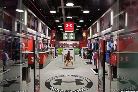 Under Armour (UA) Moves to Control Own Future by Opening 200 New Stores in 2016 - TheStreet Under Armour Store, Retail Space Design, Retail Lighting, Visual Merchandising Displays, Store Layout, Store Interiors, Sports Store, Retail Store Design, Retail Design Blog