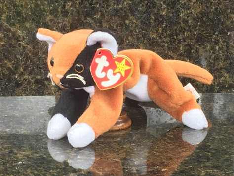 Ty Beanie Baby, Chip (1996) - P.V.C. (style 4121)  DATE OF BIRTH: 1-26-96 Black and gold, brown and white The shades of her coat are quite a sight A mixing her colors she was a master On anyone else it would be a disaster! Rare, Retired, and Extremely Hard to Find  Mint Condition Container-Stored Smoke-free environment Tag Protector (removed only for photos) P.V.C. Pellets (labeled on Tush Tag) Actual item shown Additional photos available on request Ty Plushies, Cow Plush, Original Beanie Babies, Cute Stuffed Animals, Beanie Babies, Beanie Baby, Ty Beanie, Animal Dolls, Plush Animals