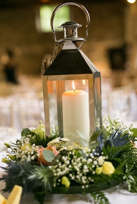 Wedding centre piece lantern with David Austen roses, thistles and eucalyptus Thistle Centre Pieces Wedding, Centre Pieces Wedding, March Wedding, Silver Candle, Candle Lantern, Commitment Ceremony, Eucalyptus Wreath, Wedding Breakfast, Aisle Decor