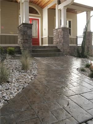 Stamped concrete walkway and front porch. Love the masonry on the pillars. Stamped Concrete Designs, Concrete Patterns, Stamped Concrete Patterns, Stamped Concrete Walkway, Stamp Concrete, Front Yard Walkway, Concrete Walkway, Front Walkway, Stamped Concrete Patio