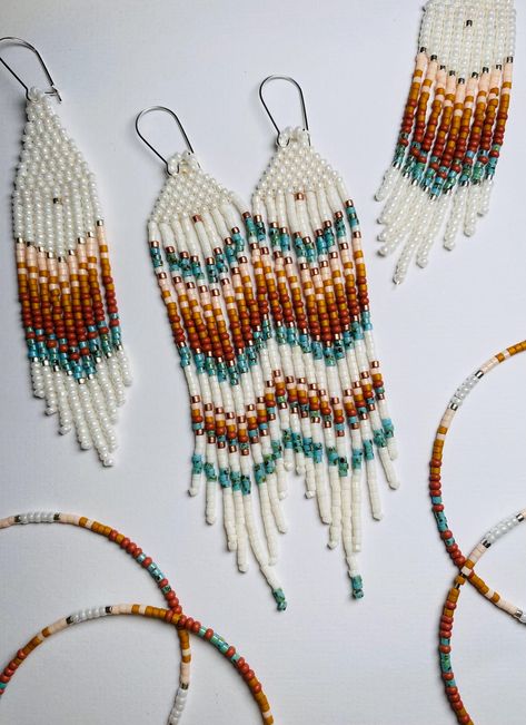 Handmade Boho Fringe Earrings made by Artisan Betty Conant one seed bead at a time.  These beaded Fringe Earrings hang about 4" long and sway beautifully. Sterling silver ear hooks Inspired by Native American Design. Native Seed Bead Earrings, Seed Bead Earrings Ideas, Fall Beaded Earrings, Bead Earring Patterns, Native American Beadwork Earrings, Native American Beadwork Patterns, Beautiful Beaded Earring, Fall Bead, Seed Bead Jewelry Patterns