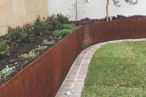 Enhance your garden's allure with weathering steel edging, adding both style and durability. Elevate your landscaping from Henderson Garden Supply today.