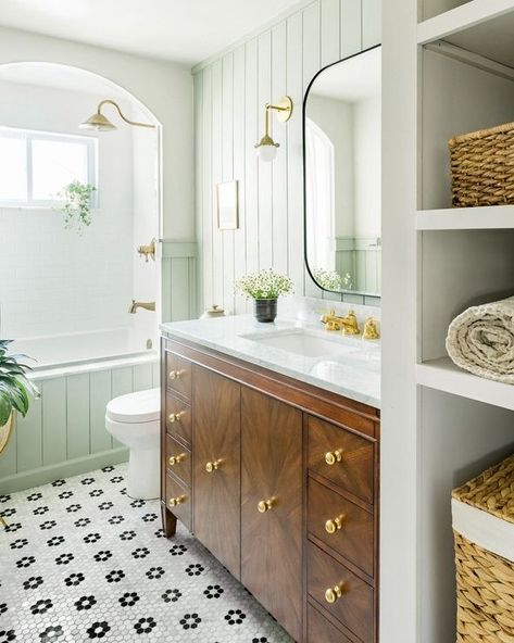 a bright and airy bathroom with a drop in tub, walnut wood vanity, and mirror Small Colonial Bathroom, White Bathroom With Wooden Vanity, Colonial Bathroom Remodel, Traditional English Bathroom, Bathrooms With Tubs And Shower Combo, Classic Timeless Bathroom Design, Drummond Bathroom, Natural Wood Wainscoting Bathroom, Traditional Cottage Bathroom