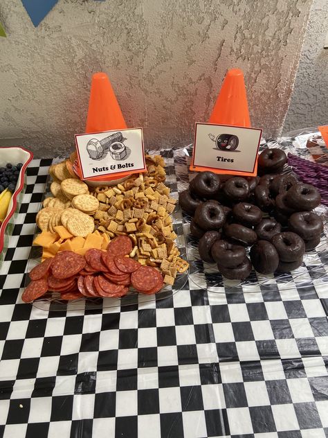 Monster Truck Party Snack Ideas, Hotwheels Birthday Food Ideas, Racetrack Food Ideas, Monster Jam Snack Ideas, Car And Truck Theme Birthday Party, Monster Truck Theme Party Food, Racing Third Birthday, Monster Cars Birthday Party, Food Ideas For Monster Truck Party