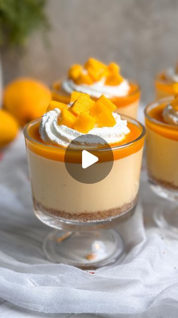 Zoha Malik on Instagram: "Mango lovers, this Eid is your time to shine! These No Bake Mango Cheesecake Cups are really easy to make, creamy, dreamy and absolutely delicious. Imagine mango ice cream meets cheesecake 🥭🤤 And can we talk about how incredible these will look on your Eid dessert tables?!  Grab the full recipe through the link in my bio. Happy (no) baking! 🥰  #eiddesserts #eid #ramadan #ramadanrecipes #mangocheesecake #nobakecheesecake #cheesecakecups #dessertcups #mangodessert" Mango Mini Desserts, Mango Parfait Desserts, Mango Cream Recipe, Mango Desserts Easy, Mango Mousse Cups, Mango Cheesecake Cups, Mango Dessert Ideas, Mango Dessert Cups, Mango Deserts Easy