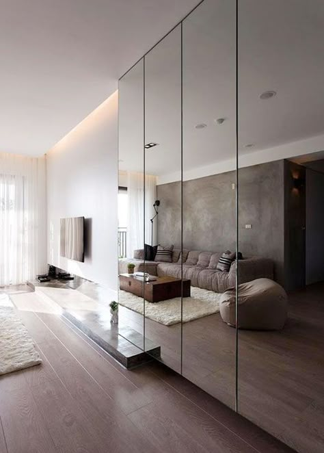 Mirror Feature Wall Living Room, Mirrored Walls, Wall Mirror Decor Living Room, Mirror Decor Living Room, Room Mirror, Glass Mirrors, Wardrobe Design Bedroom, Mirrored Wardrobe, غرفة ملابس