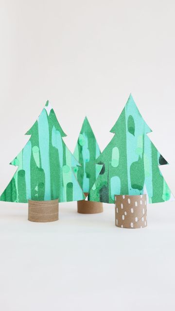 Kathryn on Instagram: "Scrape paint Christmas trees! Gave my cardboard roll trees a Christmas upgrade for #averycardboardchristmas TREE week. My squeegee broke on the first tree so sorry but you got a weird video 😂. You’ve still got a little Time to get your entries in before Vicki picks her top 8 🎄📦 @4plusmama #wearecardboardfolk #christmascraft #christmascrafts #recycleandplay #recyclemeplay #cardboardcrafts #recycledcrafts #cardboardart #cardboardcreations #cardboardtoys #diychristmasdecor #diychristmas #diychrostmasdecorations #christmasactivitiesforkids #christmasactivities #kidscraft #kidscrafts #kidscraft101 #cardboardboxcreative #diycardboardplay #cardboardchristmas" Card Board Christmas Trees, Cardboard Trees Diy, Cardboard Christmas Tree Craft, Cardboard Christmas Crafts For Kids, Paper Trees Christmas, Diy Cardboard Christmas Tree, Cardboard Christmas Crafts, Christmas Tree Cardboard, Cardboard Trees