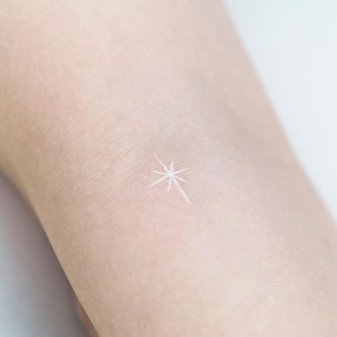 Cute Small Tattoo Ideas For Females, White Light Tattoo, White Star Tattoos For Women, White Ink Minimalist Tattoo, White Script Tattoo, White Ink Micro Tattoo, North Star Tattoo White Ink, White Minimal Tattoo, White Sparkle Tattoo