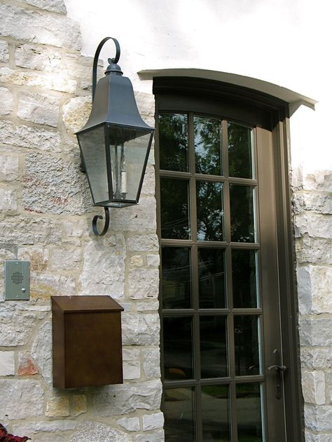 The Maison is a universal fine brass lantern, with a hint of French country elegance.  The elongated hood gives balance to the design, and the simple scroll adds the final charming detail.  This is a classic traditional lantern that is timeless. Lamping: 2 x 60 watt candelabra baseOther Options:  Hanging Lantern, Post Outside Lanterns, Country Front Door, Porch Lanterns, French Country Exterior, Front Door Lighting, Tower Light, Copper Lantern, Exterior Light Fixtures, Traditional Lanterns