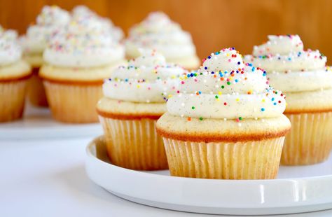 vanilla bean cupcakes topped with buttercream frosting Cupcake Topping, Cupcakes With Buttercream Frosting, Cupcakes With Buttercream, Buttercream Frosting For Cupcakes, Vanilla Bean Cupcakes, Vanilla Muffins, Cupcakes With Cream Cheese Frosting, Homemade Cupcakes, Cupcake Recipes Chocolate