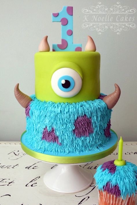 Monster Inc. cake by K Noelle Cakes Sully Birthday Cake, Diy Monsters Inc Cake, Scared Of The Month Monsters Inc, Monsters Ink 1st Birthday, Monsters University Birthday Cake, Monster Inc Bday Party, Monsters Inc Boo Cake, Monsters Ink First Birthday, Monster Inc Party Ideas 2nd Birthday