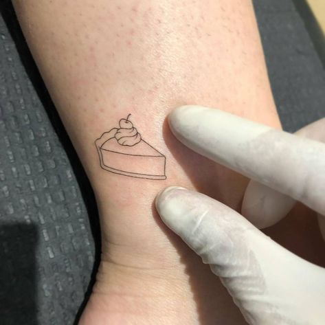 Cake Slice Tattoo Small, Pumpkin Pie Tattoo Ideas, Small Pie Tattoo, American Pie Tattoos, Piece Of Pie Tattoo, Key Lime Pie Tattoo, Slice Of Cake Tattoo Small, Tiny Cake Tattoo, Slice Of Pie Tattoo