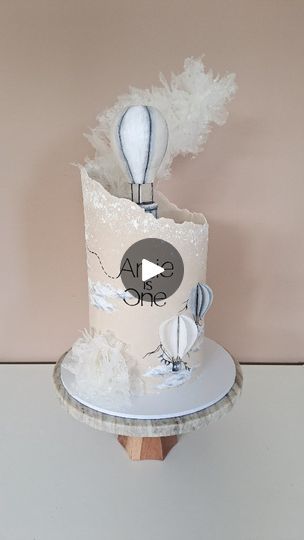 215K views · 3.8K reactions | CUTE, CLASSY, AND SHOWSTOPPING...

The brief for this one was ONEderful Adventure with hot air balloons, and I ran with it. 

I absolutely love getting creative with birthday cakes. 

Wafer paper Tulle ingredients: 

- 2.5 A4 sheets of wafer paper 
- 200g warm water 

#fondantcakes
#modernbirthdaycake #hotairballoon #waferpapercake #cutecake | Perfect Cakes Co | Timothée Chalamet · Pure Imagination (from "Wonka") Modern Birthday Cakes, Hot Air Balloon Cake, Wafer Paper Cake, Pure Imagination, Balloon Cake, Special Occasion Cakes, Wafer Paper, Hot Air Balloons, Occasion Cakes