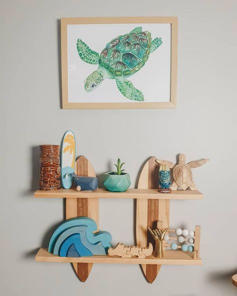 Ocean baby nursery decor with turtle painting, surf board and wooden waves Baby Boy Surfer Nursery, Boy Beach Nursery, Ocean Nursery Ideas, Ocean Baby Nursery, Seaside Nursery, Beach Baby Nursery, Melody Room, Ocean Baby Rooms, Surfer Nursery