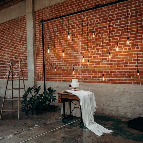 Wedding Backdrop Brick Wall, Exposed Brick Wedding Decor, Wedding Brick Wall, Brick Wedding Venue Decor, Brick Wall Lighting, Brick Photo Backdrop, Nail Suite Ideas, Brick Wall Wedding, Nail Suite