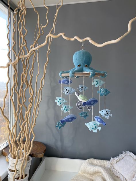 "♡ This mobile is specially designed for the nautical themed nursery decor . The octopus makes the mobile special. The little fishes are painted with acrylic paint by hand. This is my author's design. You will not find this design in any other store. You may be sure it would be a perfect gift for new mother and her baby. And It is a wonderful decor for nursery as well. ♡ This is a handmade mobile . I do each seam with my own hands! I don't use a sewing machine. I design and draw all templates fo Baby Room Ocean Theme, Cute Baby Nursery Ideas, Girl Nautical Nursery, Octopus Nursery, Nautical Mobile, Fish Mobile, Hanging Crib, Handmade Mobile, Mobile Hanger