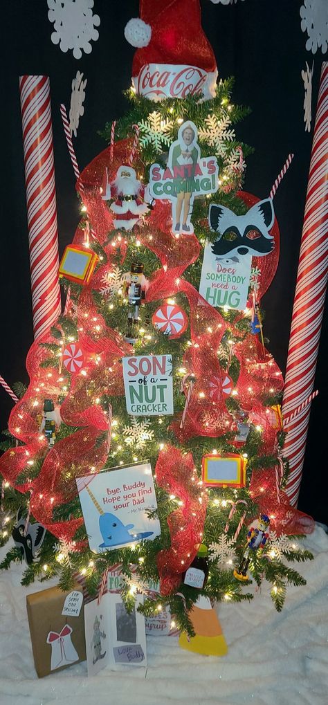 Buddy Elf Christmas Tree, Elf The Movie Office Decorating Ideas, Buddy The Elf Themed Christmas Tree, Elf The Movie Christmas Tree, Elf Movie Christmas Tree, Buddy The Elf Tree, Elf Movie Christmas Decorations, Buddy The Elf Christmas Tree, Swimming Party Favors