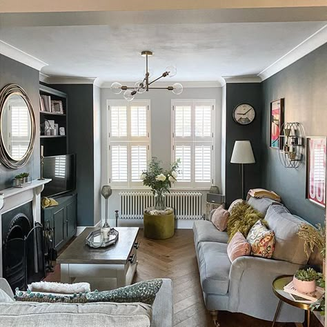 We adore this lounge with herringbone floor in an Edwardian home. The walls are dark which keeps the room snug looking. The period features have been restored including the fireplace and cornicing. In the home of @roseontherow on Instagram. Edwardian Living Room, Edwardian Home, Snug Room, Feature Wall Living Room, Narrow Living Room, Victorian Living Room, Dark Living Rooms, Park Street, Cosy Living