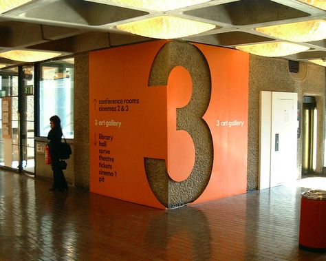 Using cutouts applied to wall, and around corner Graphic Signage, Interior Wayfinding, Parking Ideas, Wall Branding, Wall Graphics Design, Floor Signage, Environmental Branding, Building Signage, Wayfinding Signage Design