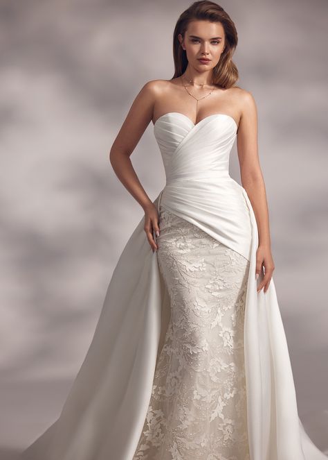 Sephora – heart-shaped neckline strapless dress with asymmetric wrap top and lace straight skirt, complemented with a smooth voluminous overskirt. Wedding Gown Overskirt, Wedding Dresses With Overskirt, Dresses With Overskirt, Eva Lendel, Over Skirt, Beach Wedding Photos, Dresses Lace, Elegant Wedding Dress, Straight Skirt