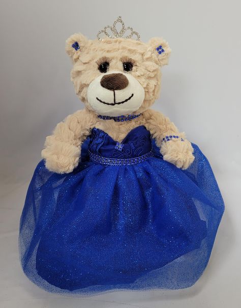 PRICES MAY VARY. 12" Quinceanera Teddy Bear with dress Can be given as a gift or used as a centerpiece 12 inches in height. Rhinestone tiara and an embroidered " Mis 15 Anos" For Collection and Decoration Purpose. For Age 14+. Due to different monitors/calibrations colors may vary slighty from the actual product. For those that are looking for something other than a doll... we now have the option of Quince Bears. These bears measure 12" long. Crème color, soft and cuddly, dressed in an elegant, Quince Bear Royal Blue, Quinceanera Teddy Bear, Quince Teddy Bear, Royal Blue Quinceanera Teddy Bear, Royal Blue Quince Doll, Rhinestone Tiara, Creme Color, Teddy Bear Stuffed Animal, Quince