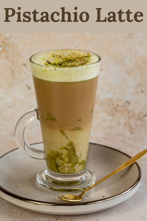 This wonderfully creamy Pistachio Latte is made with steamed milk, pistachio cream and a shot of espresso. It has the cozy flavors of sweet pistachio and is perfect for those who are a fan of the Starbucks pistachio latte. Starbucks Pistachio Latte, Pistachio Coffee, Pistachio Latte, Mixology Recipes, Pistachio Milk, Steamed Milk, Pistachio Butter, Pistachio Cream, Delicious Drink Recipes