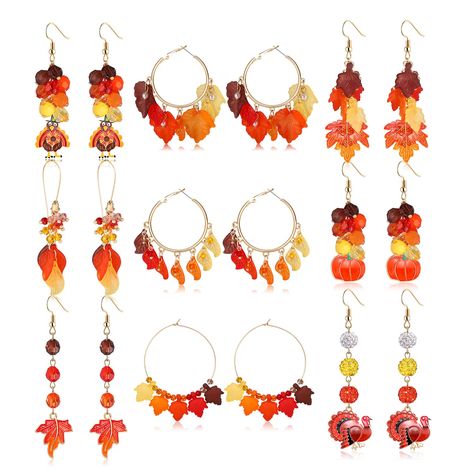 PRICES MAY VARY. Holiday Earrings for Women Variety Pack:9 pairs thanksgiving holiday themed dangling earrings including 3 pairs layer maple leaf long dangle earrings 3 pairs maple leave big round geometric hoop earrings and 3 pairs turkey pumpkin charms dangles earrings .So much styles and colors thanksgiving themed earrings bulk can matching your fall autumn outfits ,making you fashionable ,stylish , charming and more eye-catching in fall season . Hypoallergenic Thanksgiving Earrings :Fall has Diy Thanksgiving Earrings, Fall Handmade Jewelry, Thanksgiving Beaded Earrings, Fall Beaded Earrings, Fall Jewelry Ideas, Fall Beaded Jewelry, Thanksgiving Dinner Party Decor, Turkey Earrings, Thanksgiving Earrings