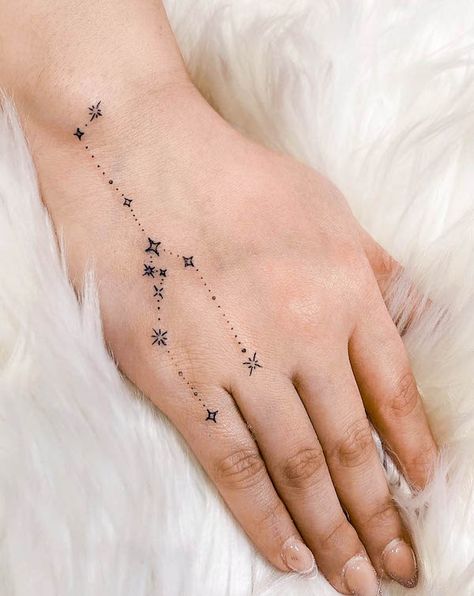 Celestial Taurus Tattoo, Earthy Taurus Tattoo, Taurus Earth Sign Tattoo, Taurus Astrology Tattoo For Women, Pretty Taurus Tattoo, Aries Constellation Hand Tattoo, Taurus Tattoo Star Constellation, Tattoo Ideas Astrology Taurus, Taurus Tattoo Hand